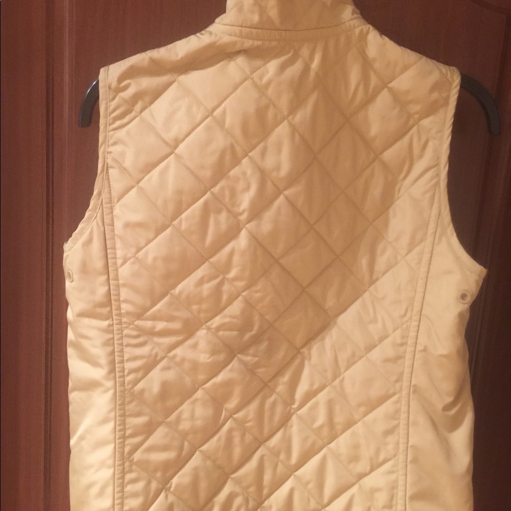 Double sided vest beige/white zipped . Pockets.